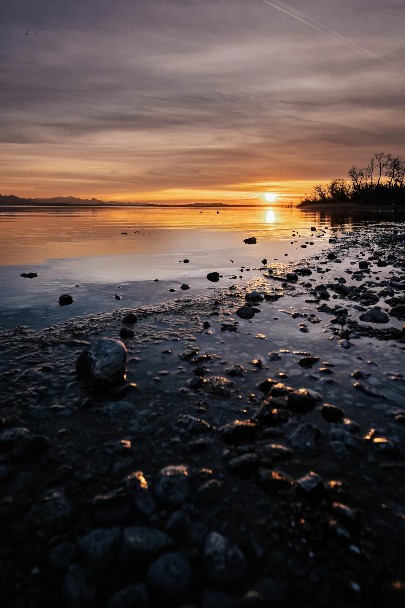 Sonnenuntergang am Chiemsee bei Stöttham und Chieming